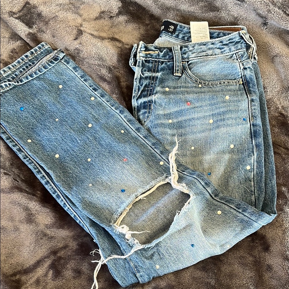 Stylish Blue Distressed Jeans with Embellishments